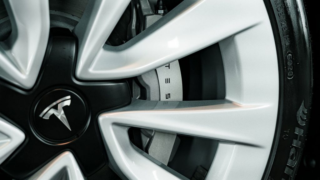 Brake disc and wheels on Tesla after kent detailing studio ceramic coating